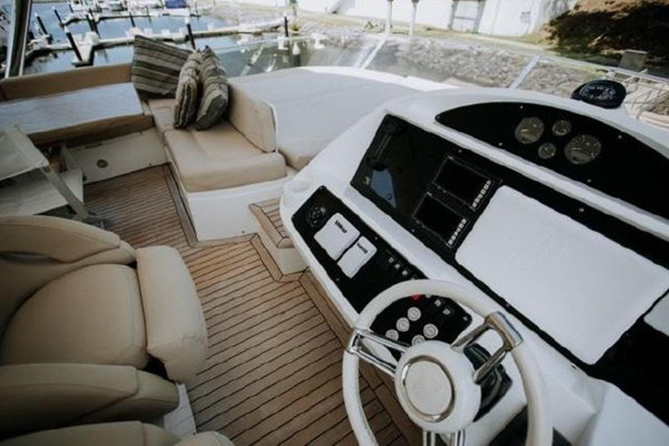 a white car with a screen aboard ASTUR Yacht for Sale