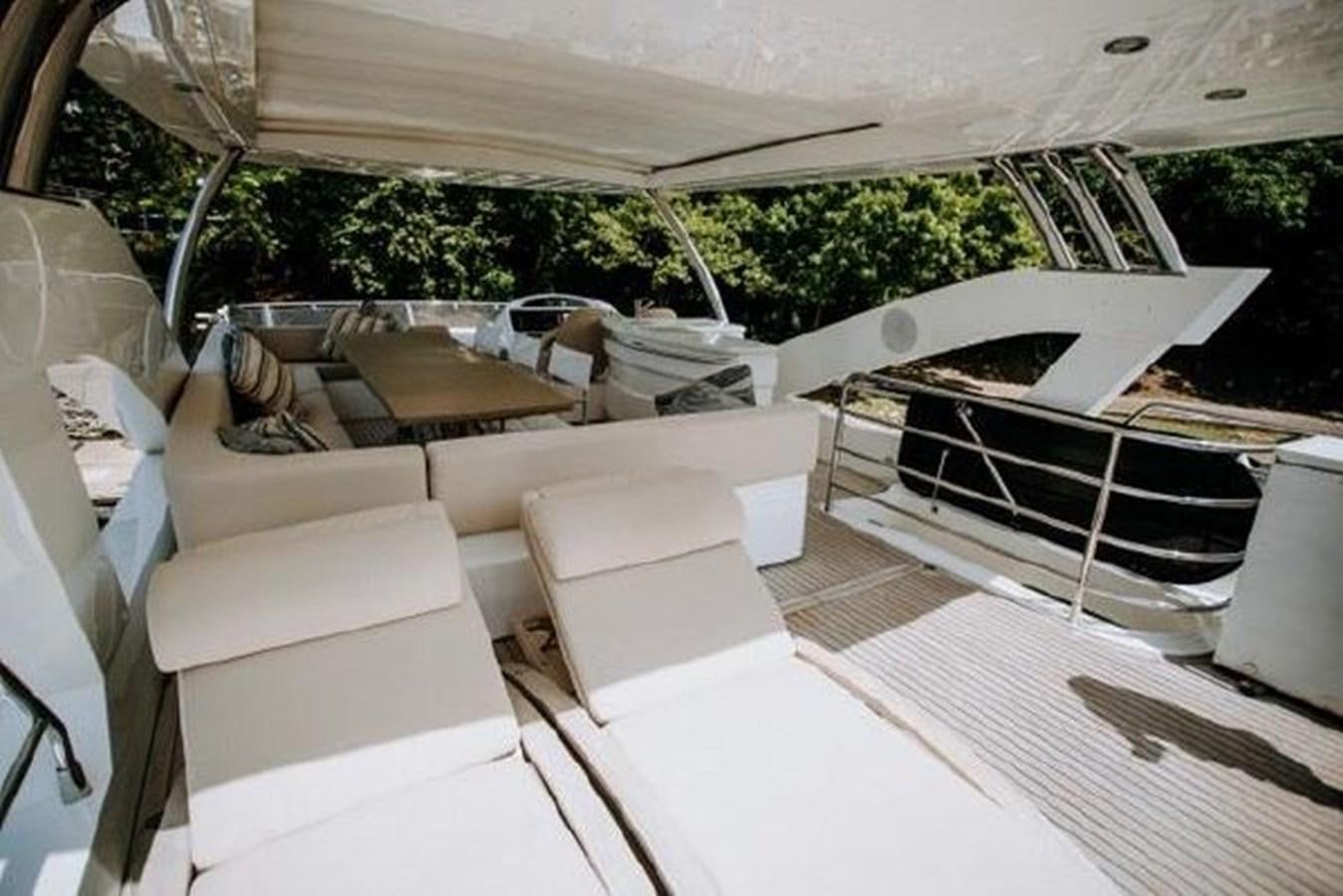 a large white tent with a table and chairs aboard ASTUR Yacht for Sale