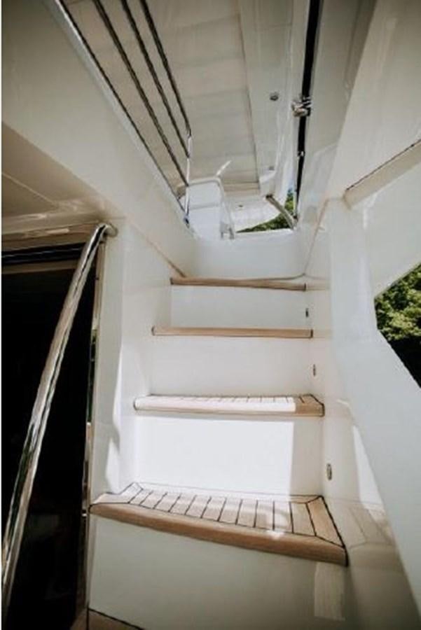 a white staircase with a railing aboard ASTUR Yacht for Sale