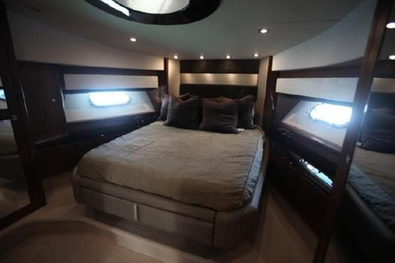 a bed in a room aboard SAM JADE Yacht for Sale