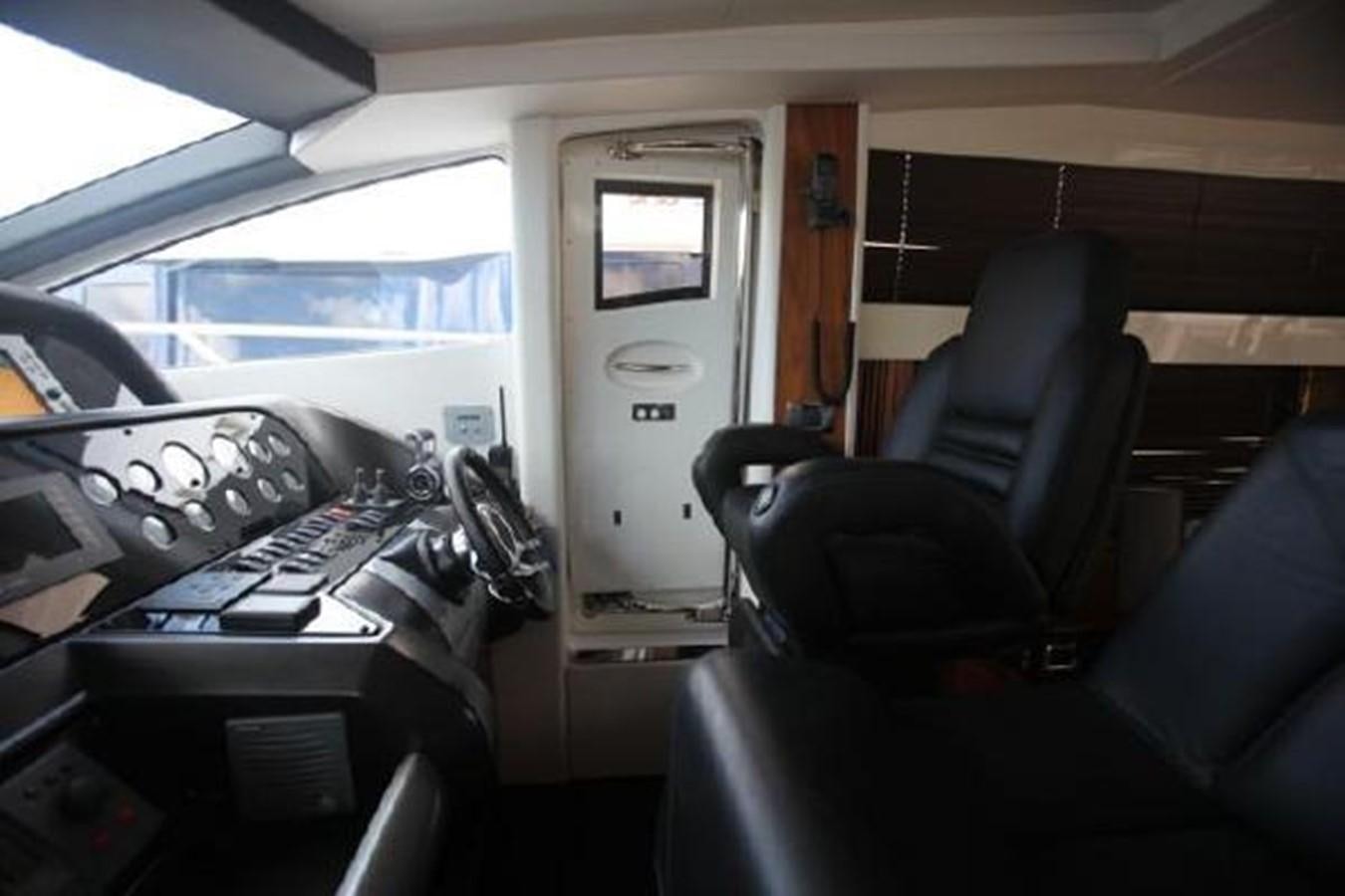 inside of a vehicle with a computer and keyboard aboard SAM JADE Yacht for Sale