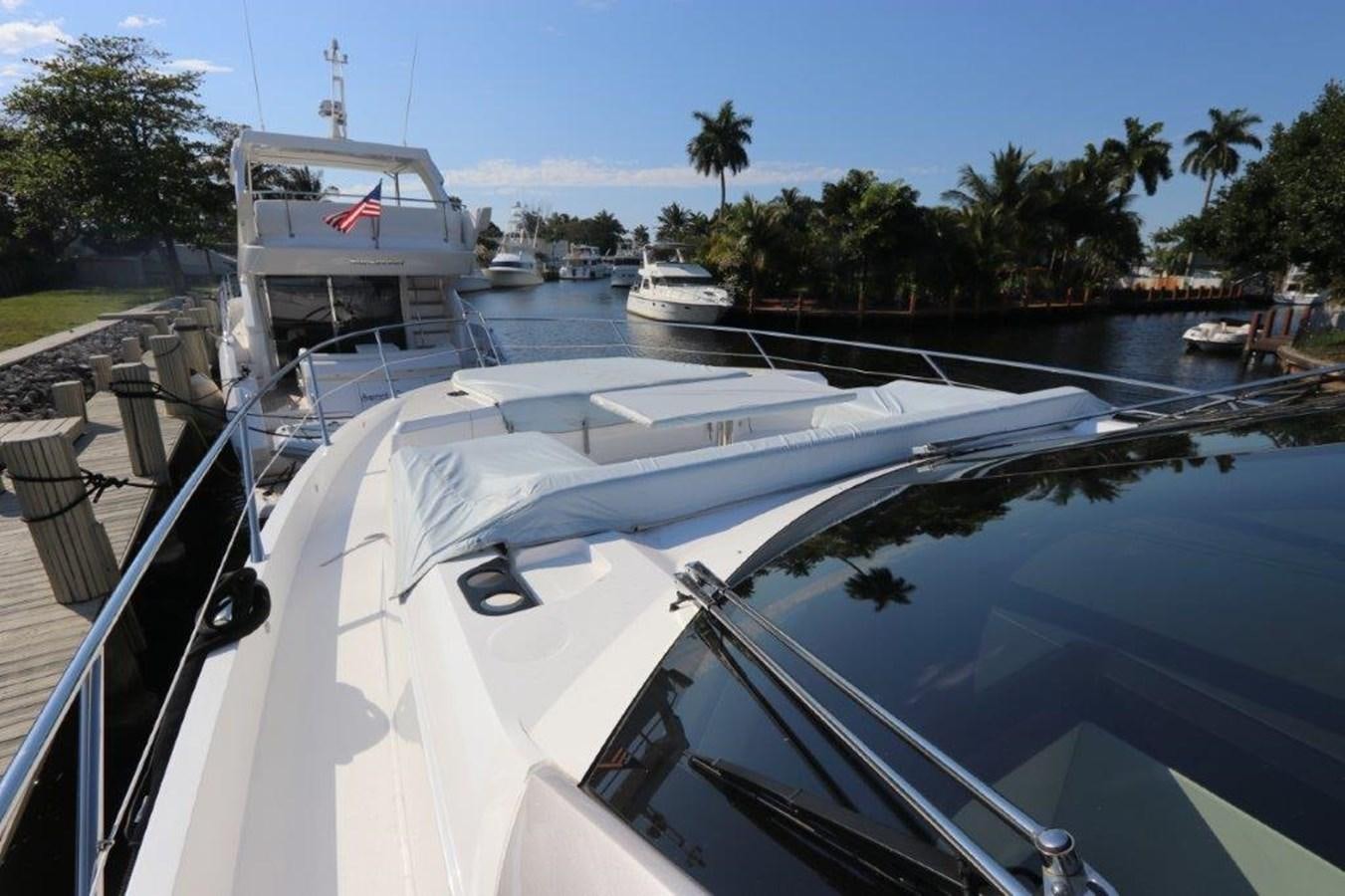 a boat in a harbor aboard HIDE OUT Yacht for Sale