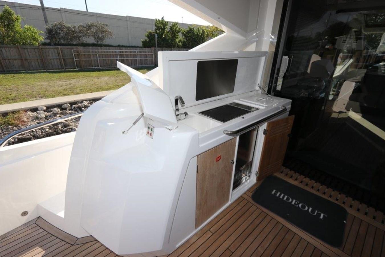 a large white machine aboard HIDE OUT Yacht for Sale