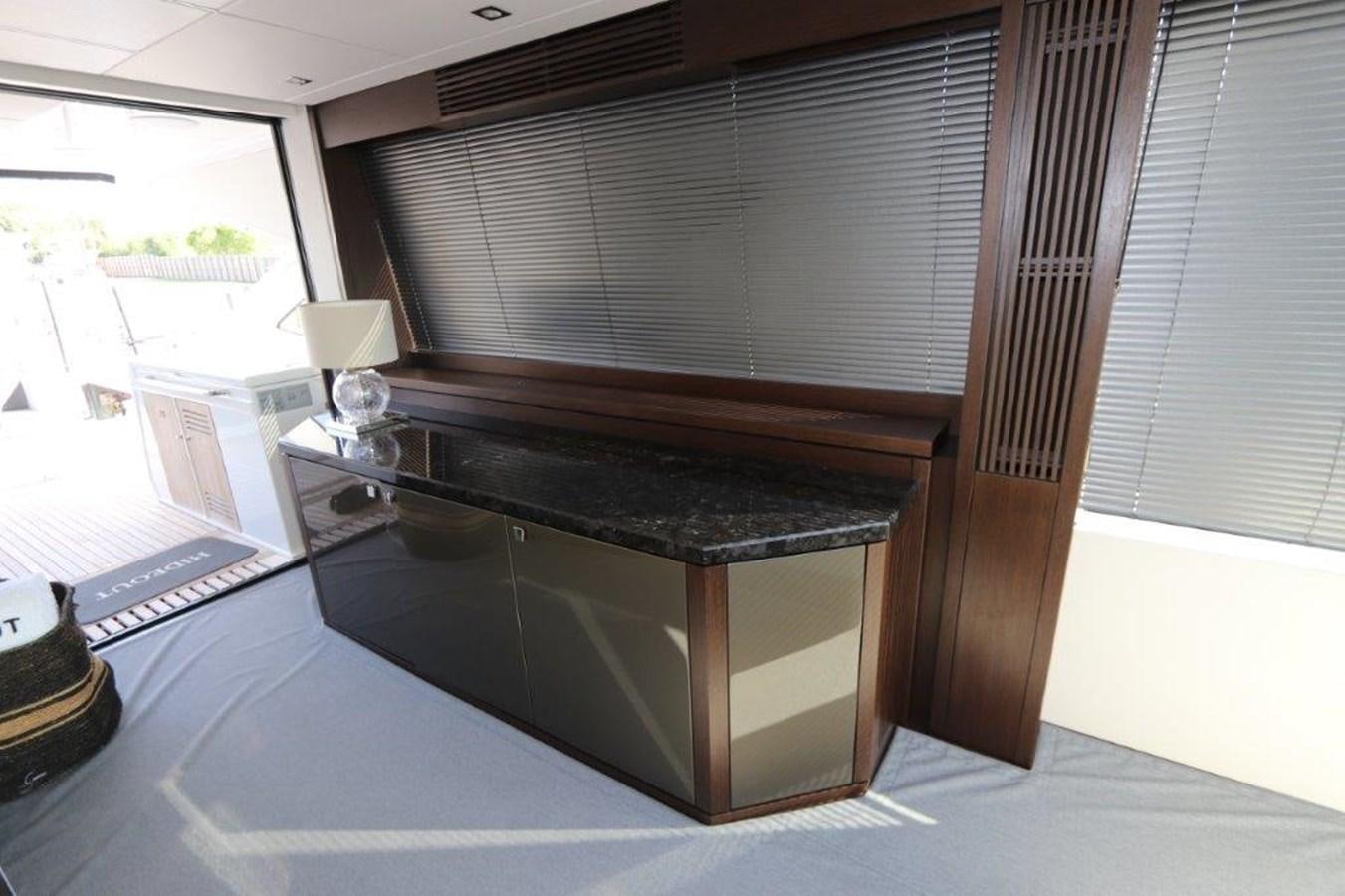 a piano in a room aboard HIDE OUT Yacht for Sale