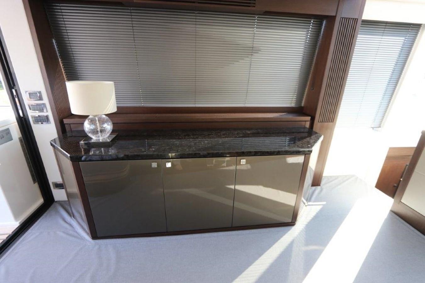 a kitchen with a large island aboard HIDE OUT Yacht for Sale