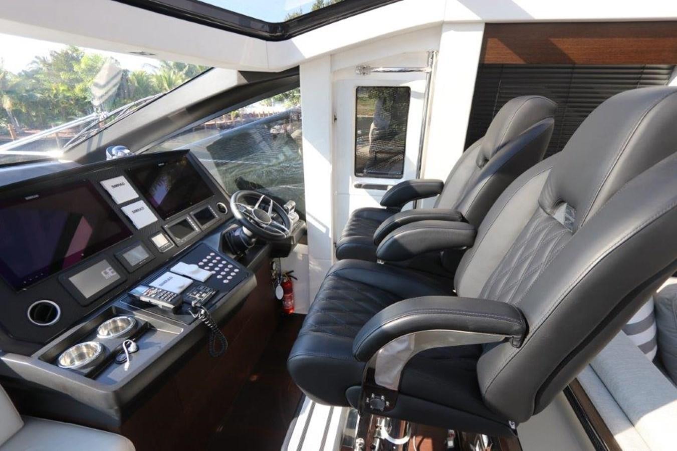inside of a car aboard HIDE OUT Yacht for Sale