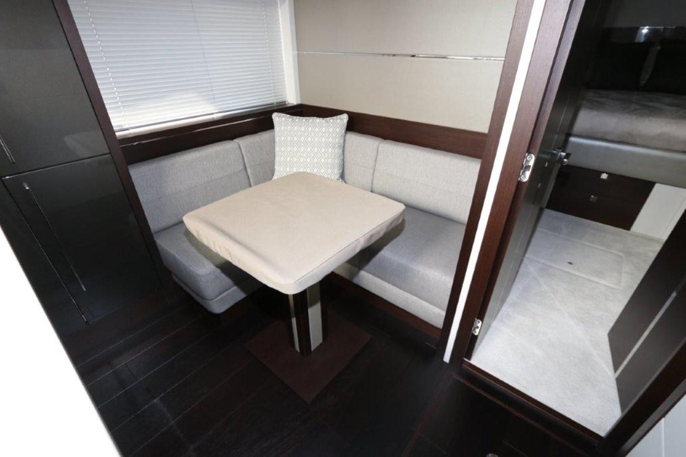 a small white table aboard HIDE OUT Yacht for Sale