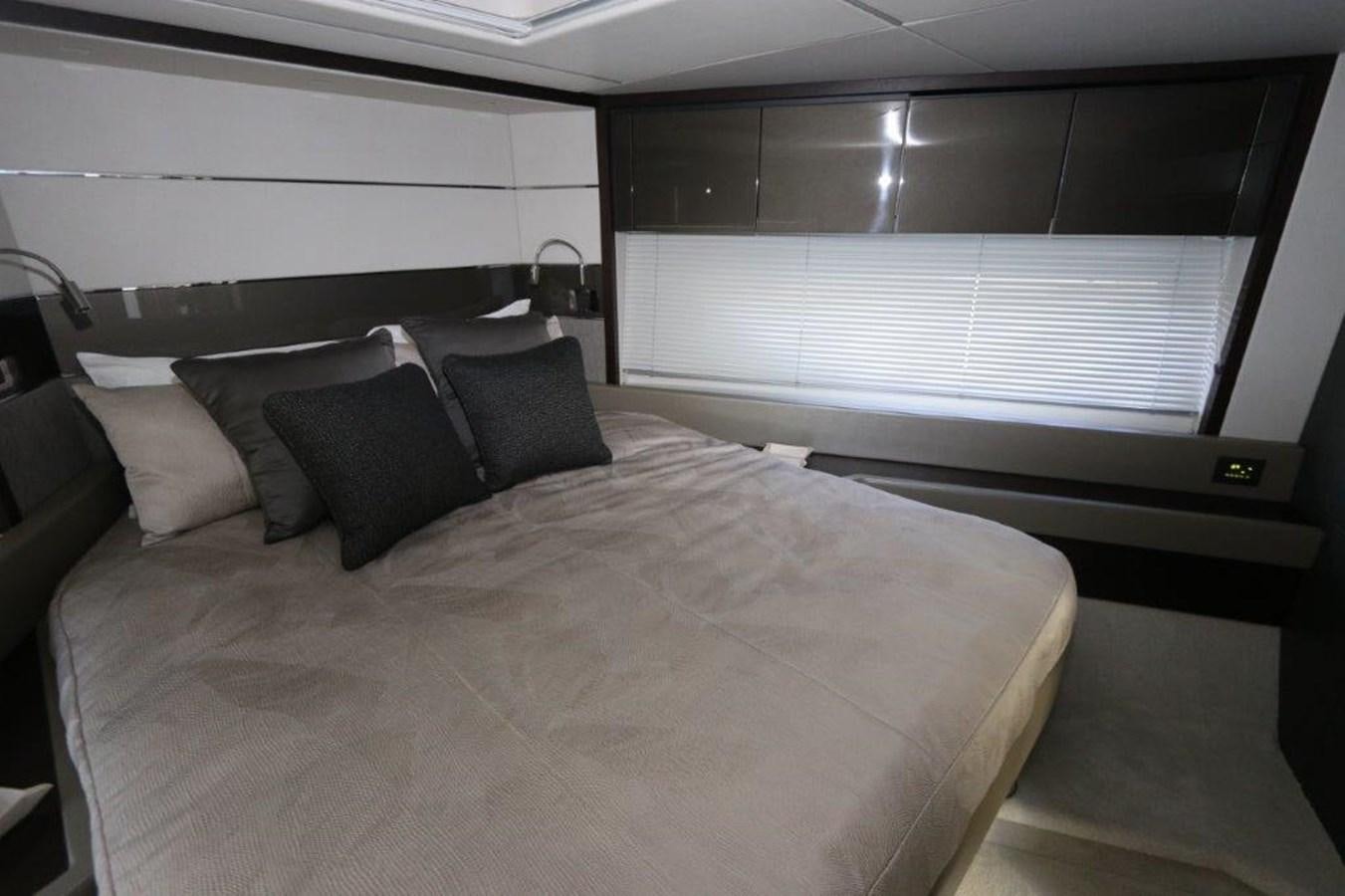 a bed with pillows aboard HIDE OUT Yacht for Sale