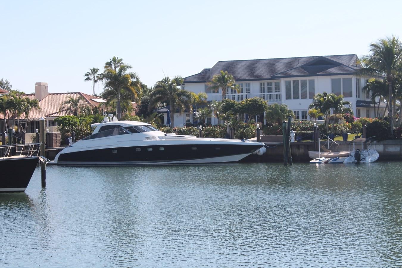 a boat in a harbor aboard MAGNIFICA Yacht for Sale