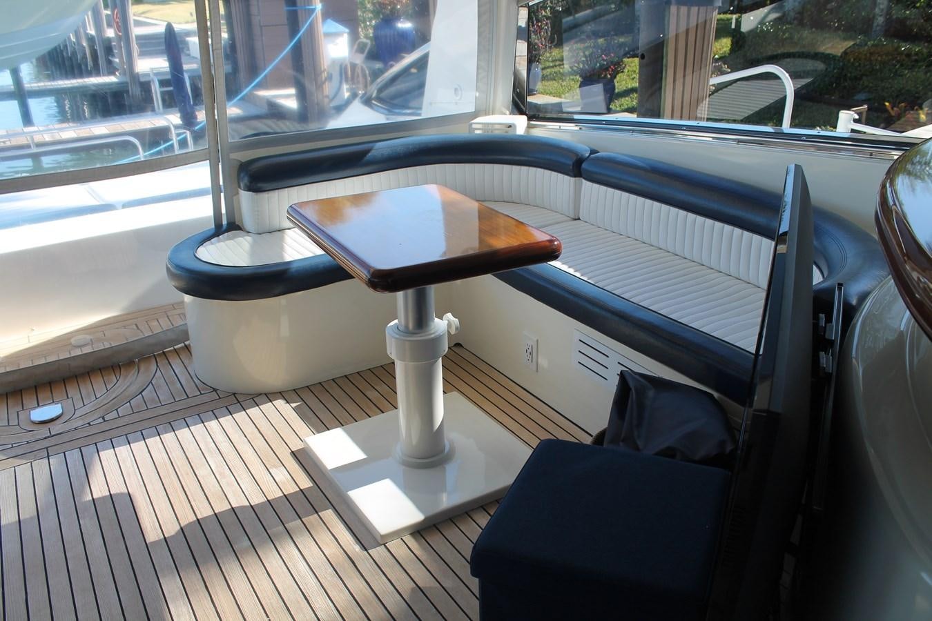 a table on a deck aboard MAGNIFICA Yacht for Sale