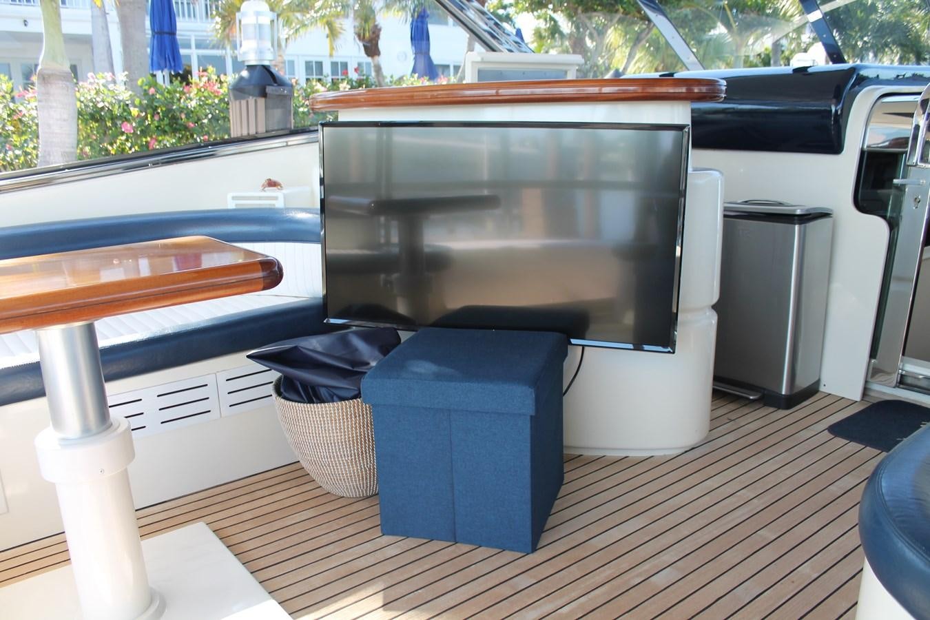a large black and white trash can on a wooden deck aboard MAGNIFICA Yacht for Sale