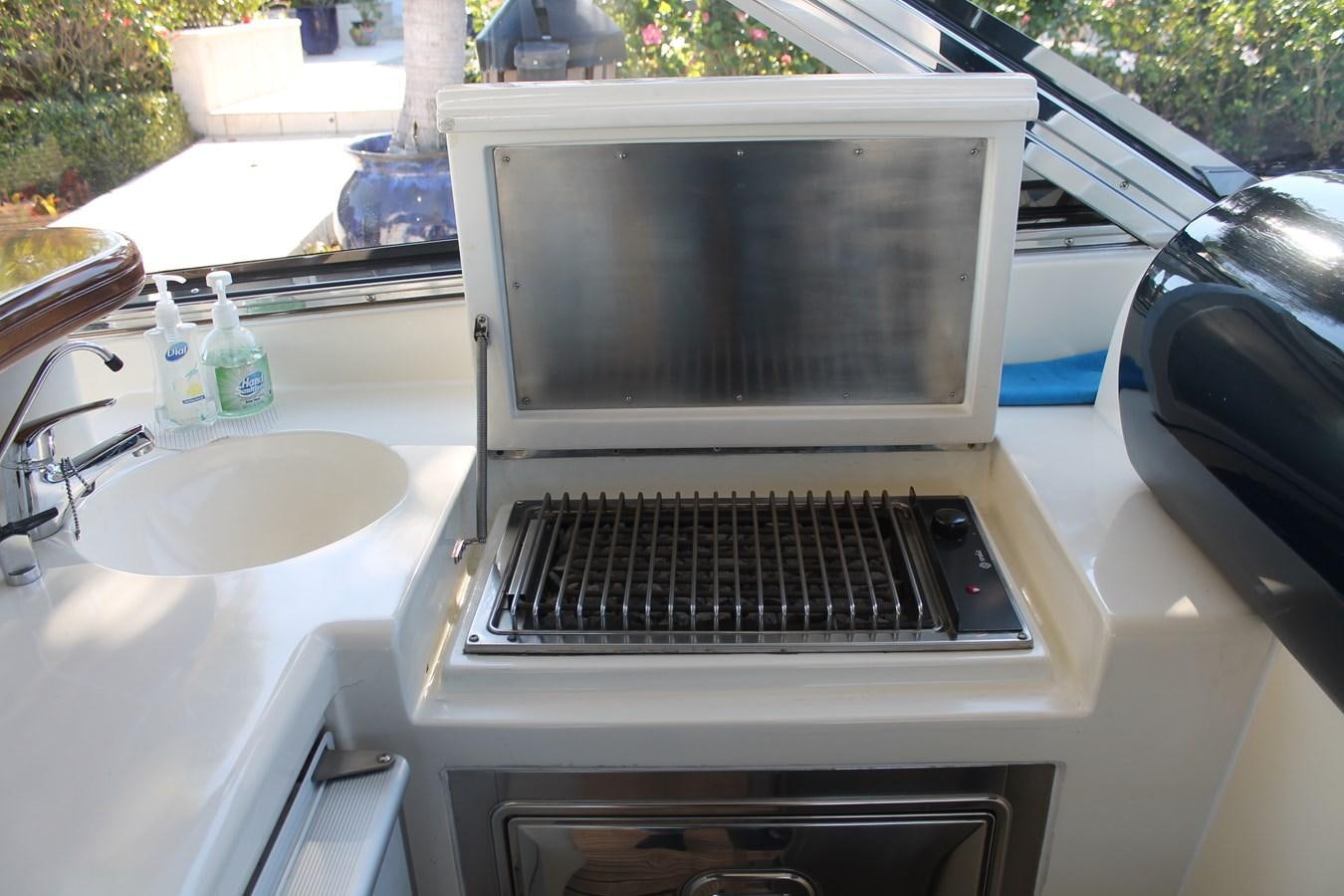 a microwave on a car aboard MAGNIFICA Yacht for Sale