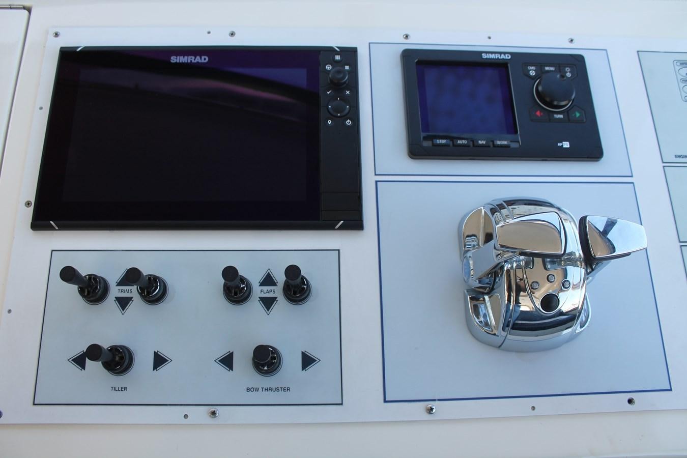 a white microwave with a silver and purple oven and a silver and black microwave aboard MAGNIFICA Yacht for Sale