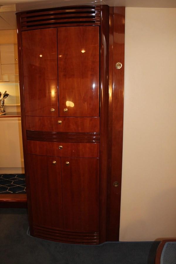 a wooden door with a glass door aboard MAGNIFICA Yacht for Sale