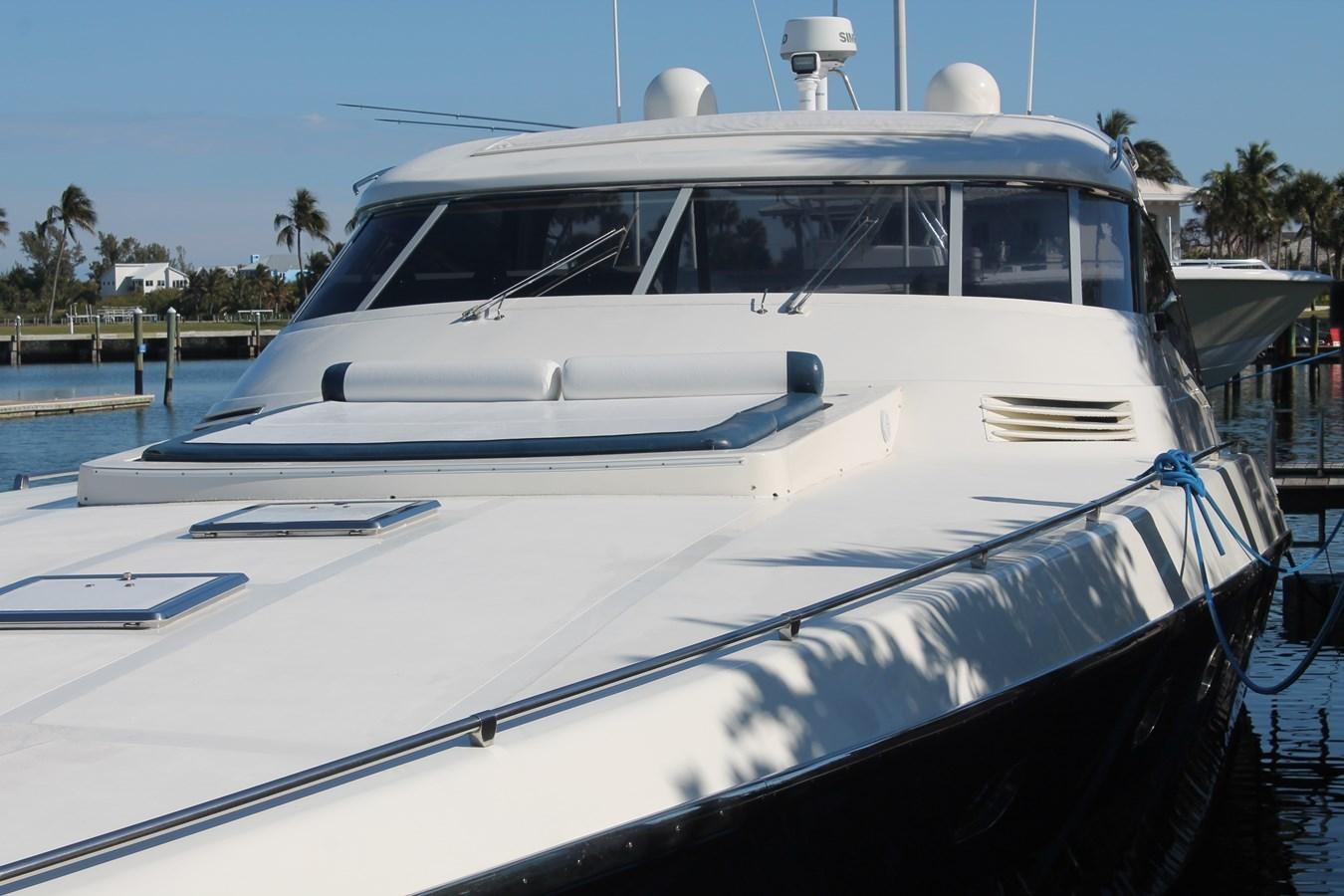 a white yacht docked aboard MAGNIFICA Yacht for Sale