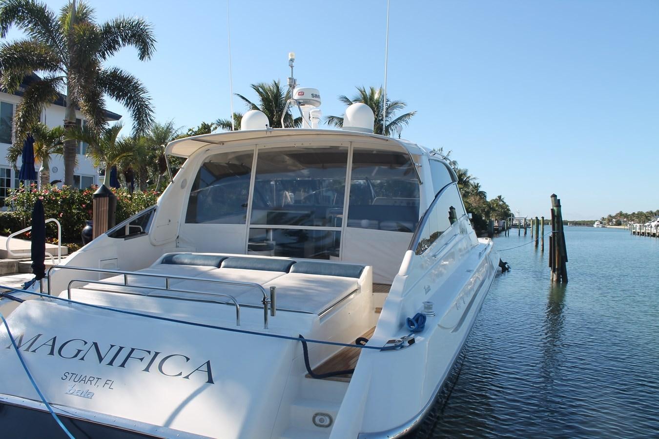 a white boat in the water aboard MAGNIFICA Yacht for Sale