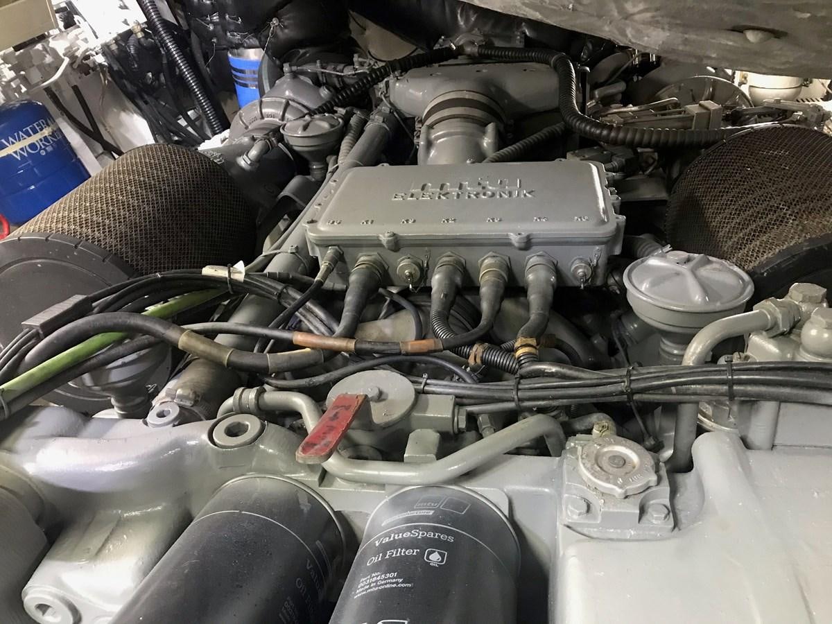 a car engine with a few parts aboard MAGNIFICA Yacht for Sale