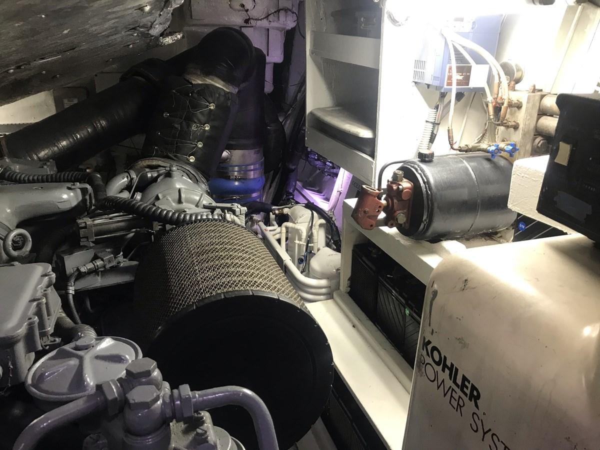 a close-up of a car engine aboard MAGNIFICA Yacht for Sale