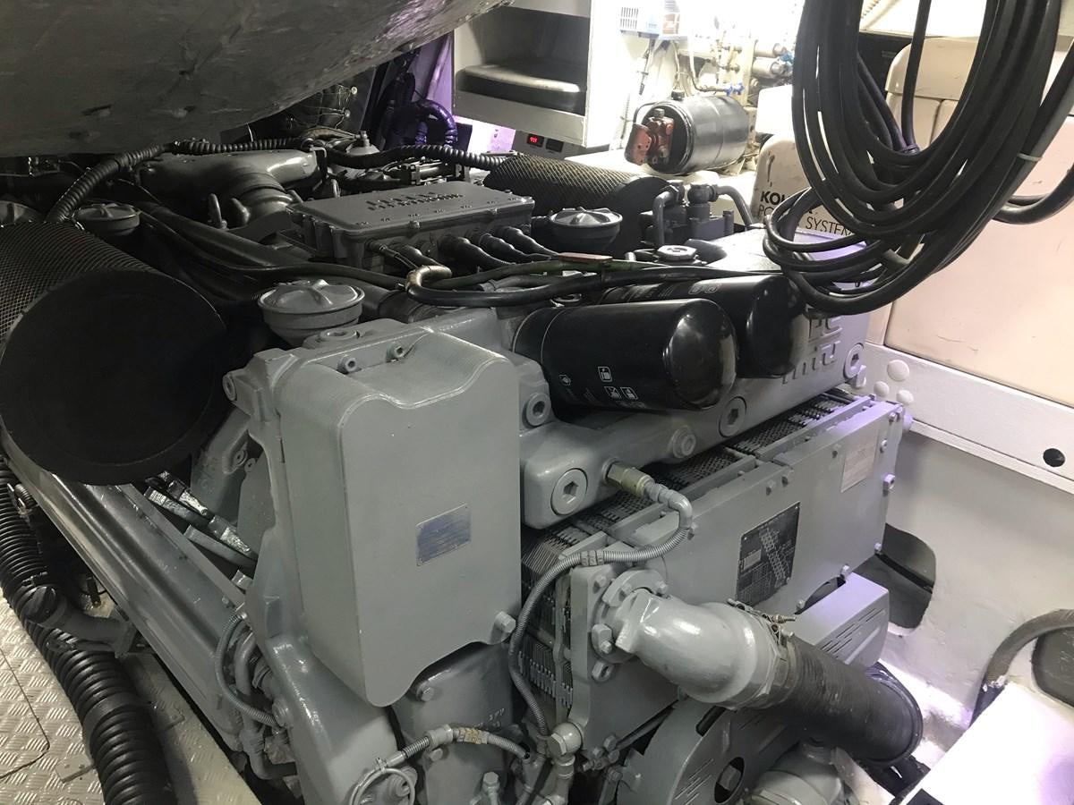 a car engine with a black cap aboard MAGNIFICA Yacht for Sale