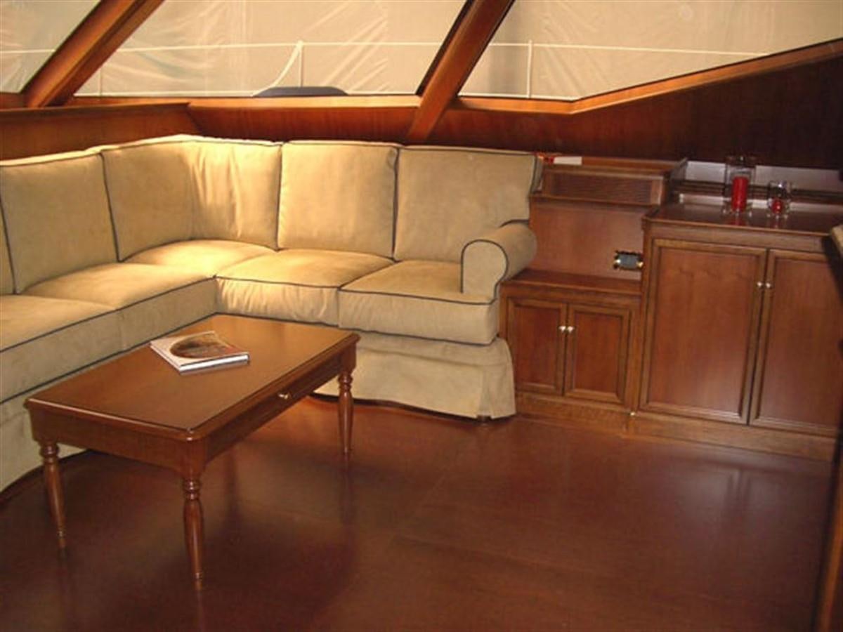 a couch in a kitchen aboard 75' 2008 YAPLUKA LUXURY CATAMARAN Yacht for Sale