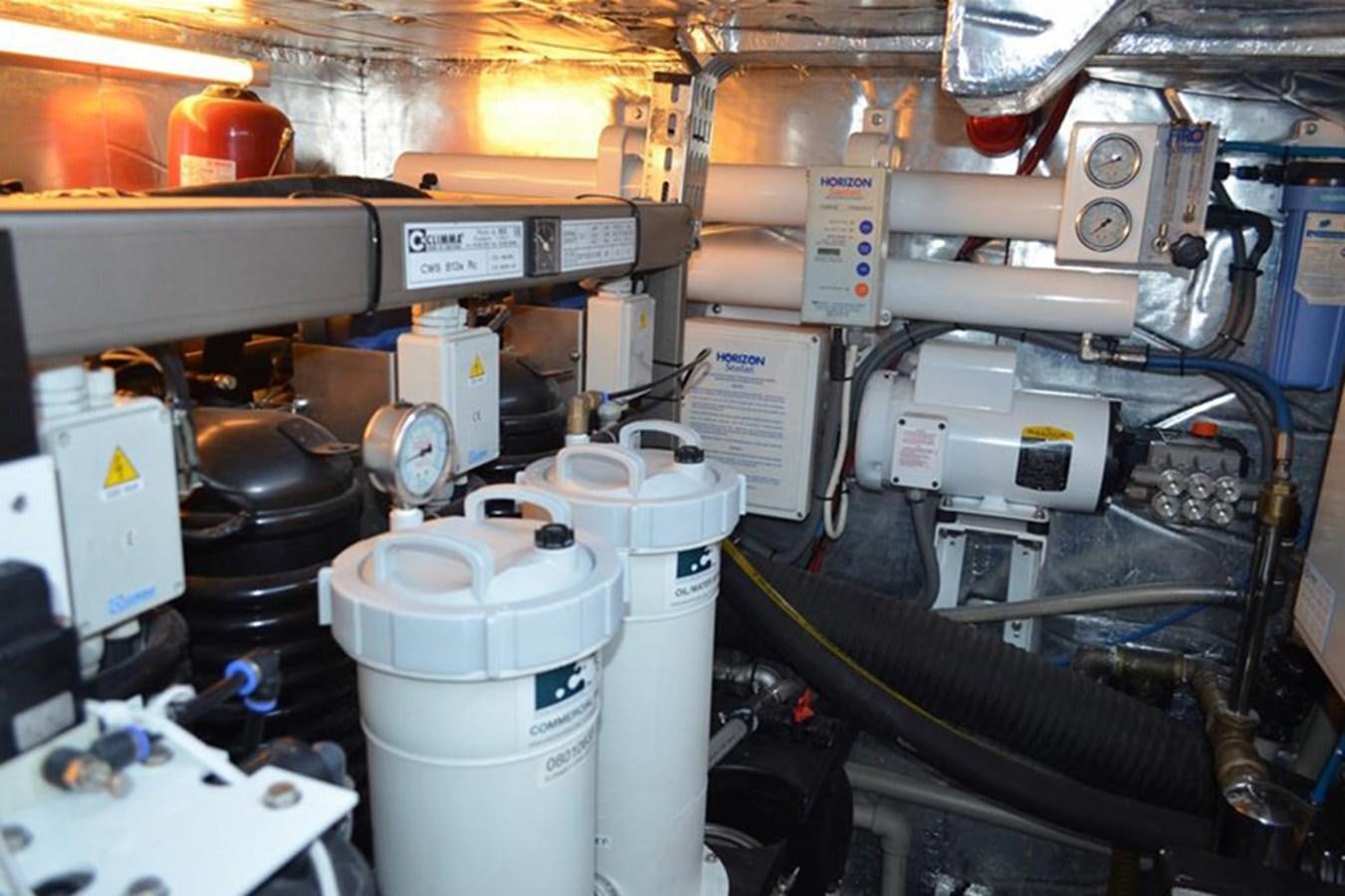 a machine in a factory aboard CASPA Yacht for Sale