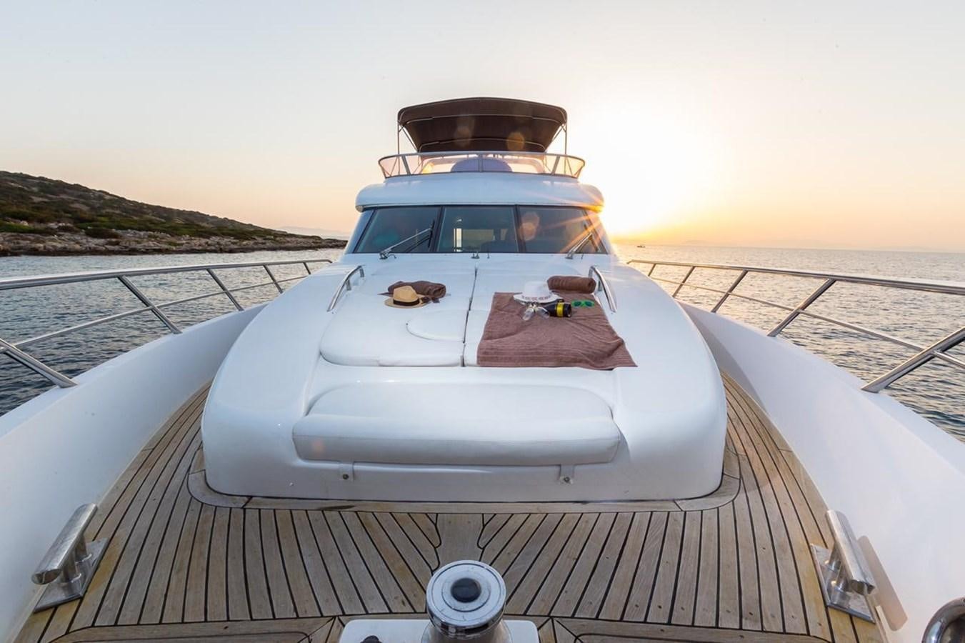 a white car with a red interior aboard MARLIN Yacht for Sale
