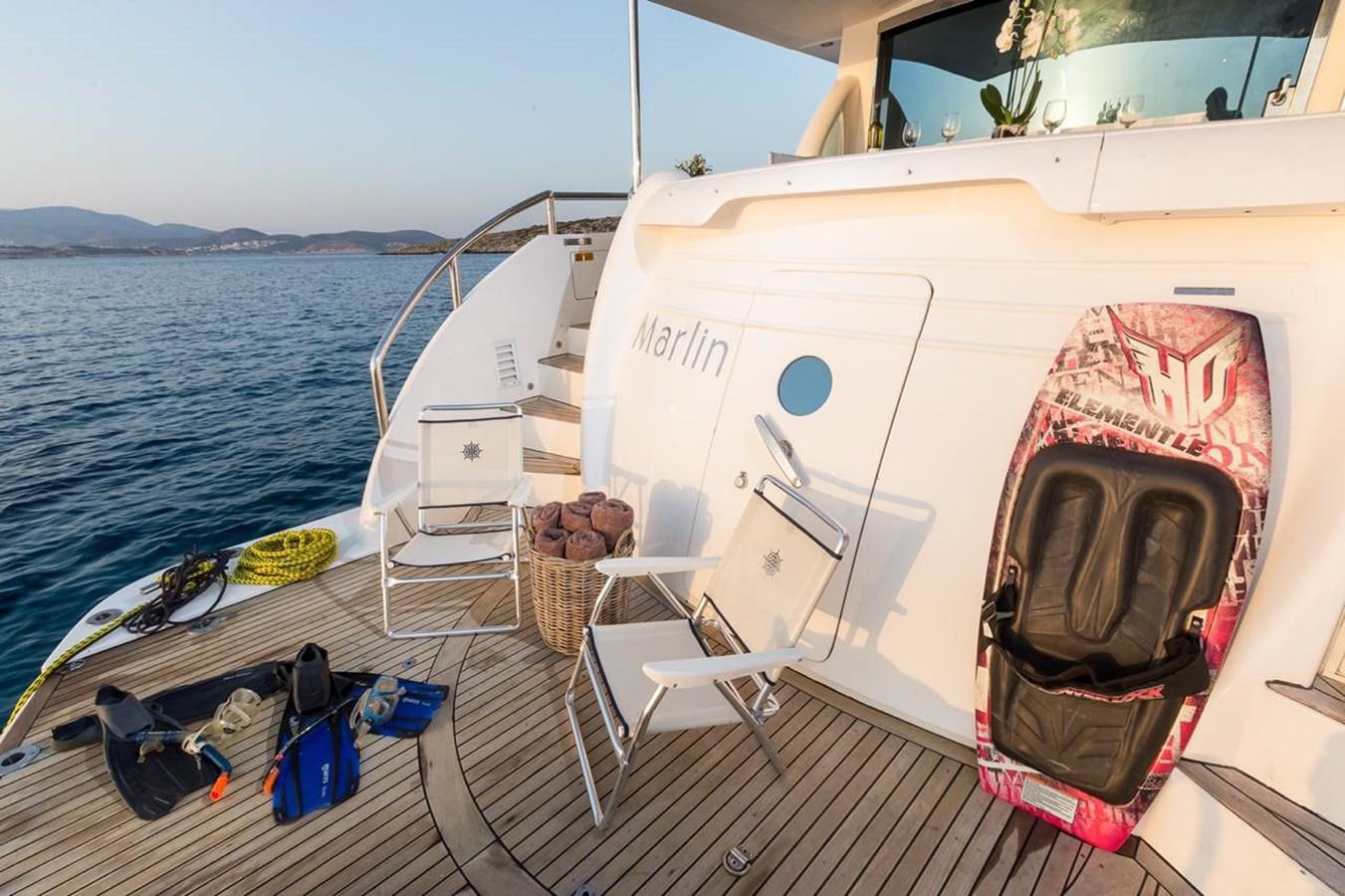 a boat on a dock aboard MARLIN Yacht for Sale