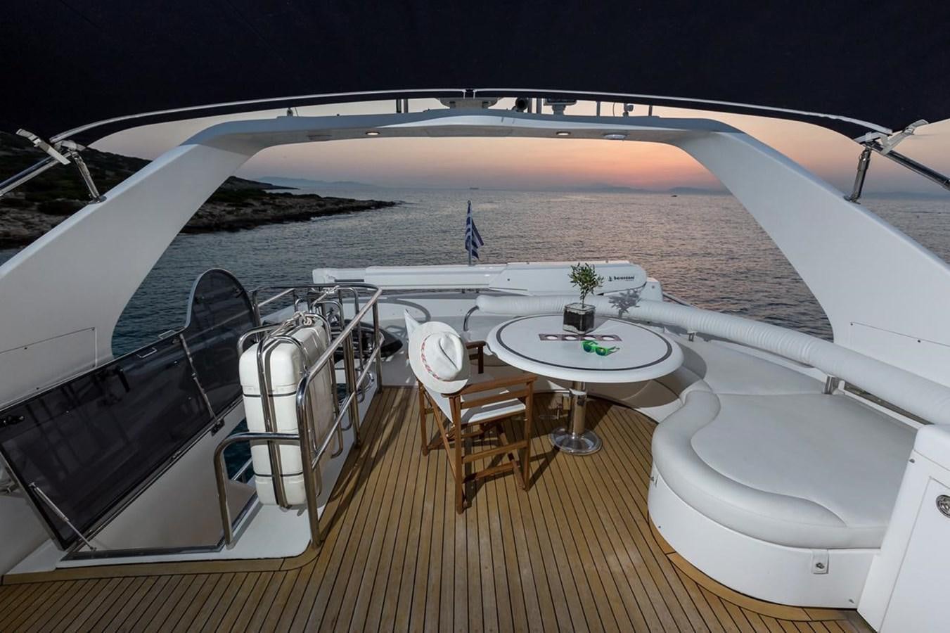 a white tent with a table and chairs on it aboard MARLIN Yacht for Sale