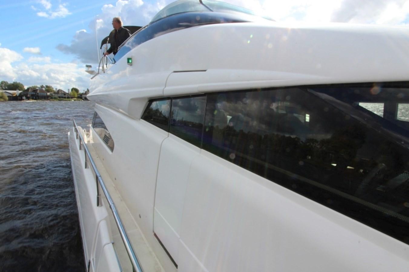 a person on a boat aboard THE RIVER Yacht for Sale