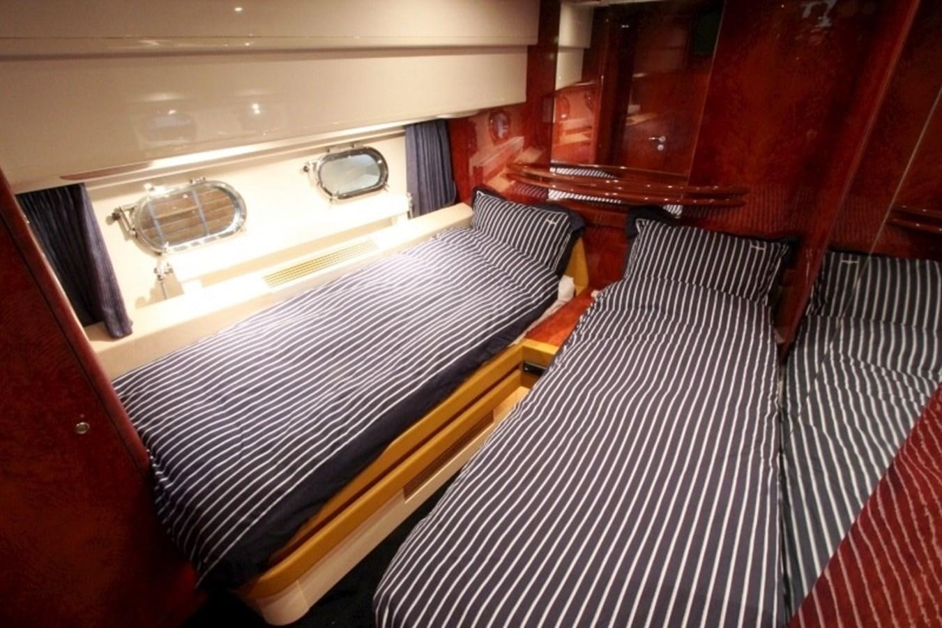 a person sitting in a chair aboard THE RIVER Yacht for Sale