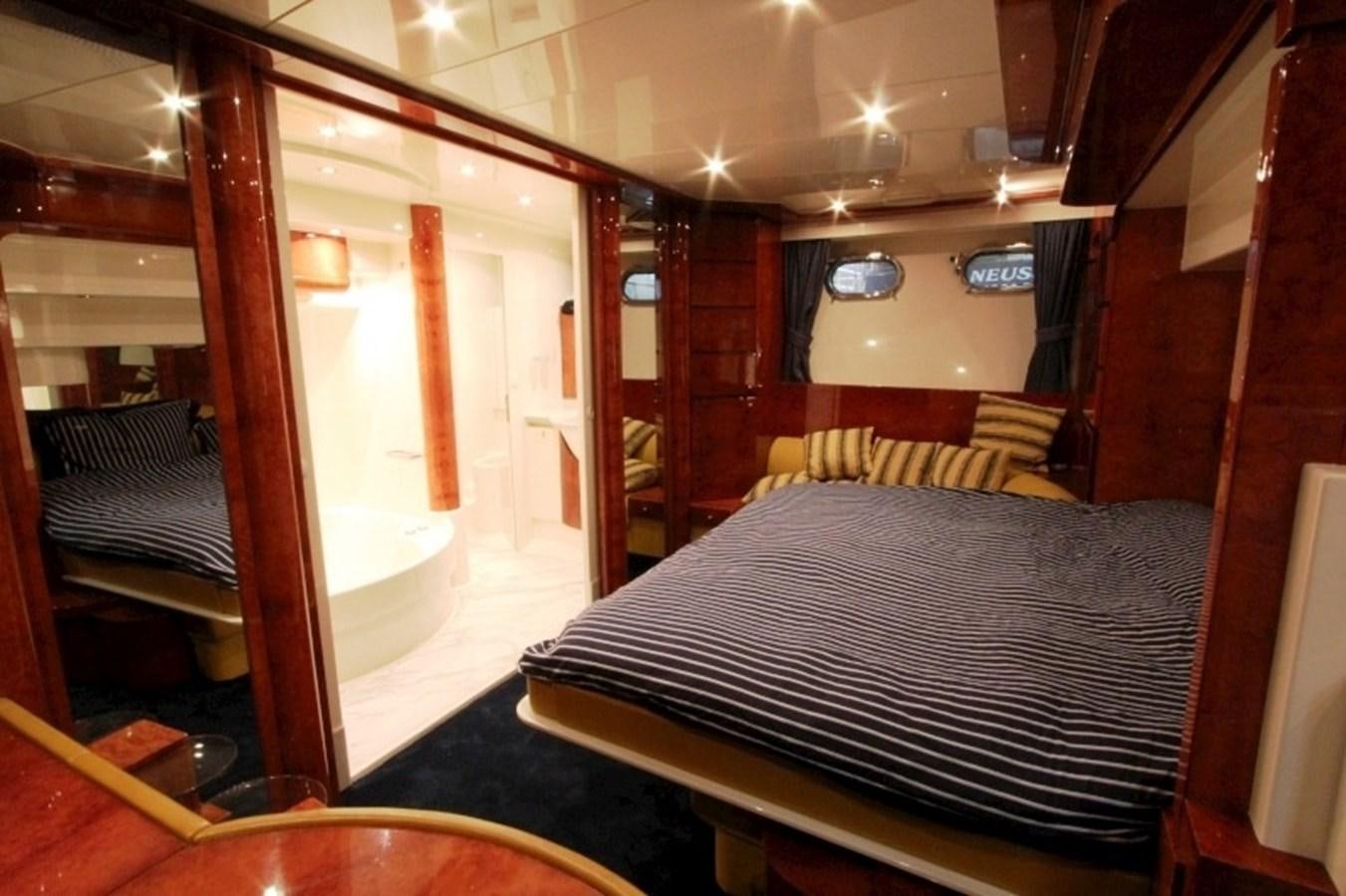 a bed in a room aboard THE RIVER Yacht for Sale