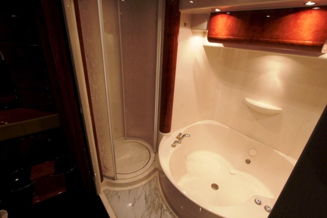 a bathroom with a sink and a mirror aboard THE RIVER Yacht for Sale