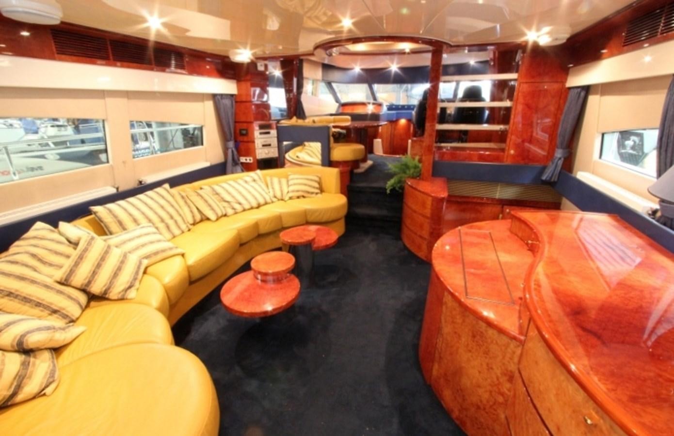 a room with couches and tables aboard THE RIVER Yacht for Sale