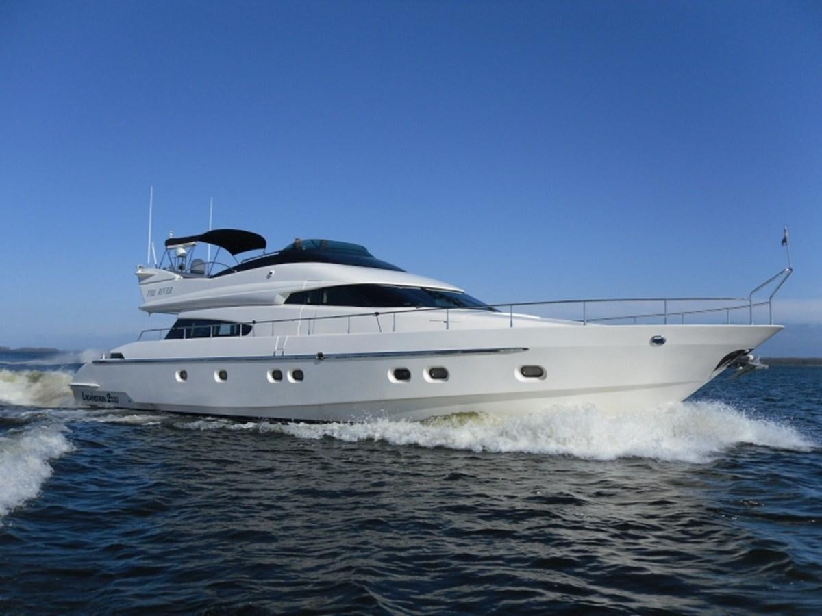 a white yacht on the water aboard THE RIVER Yacht for Sale
