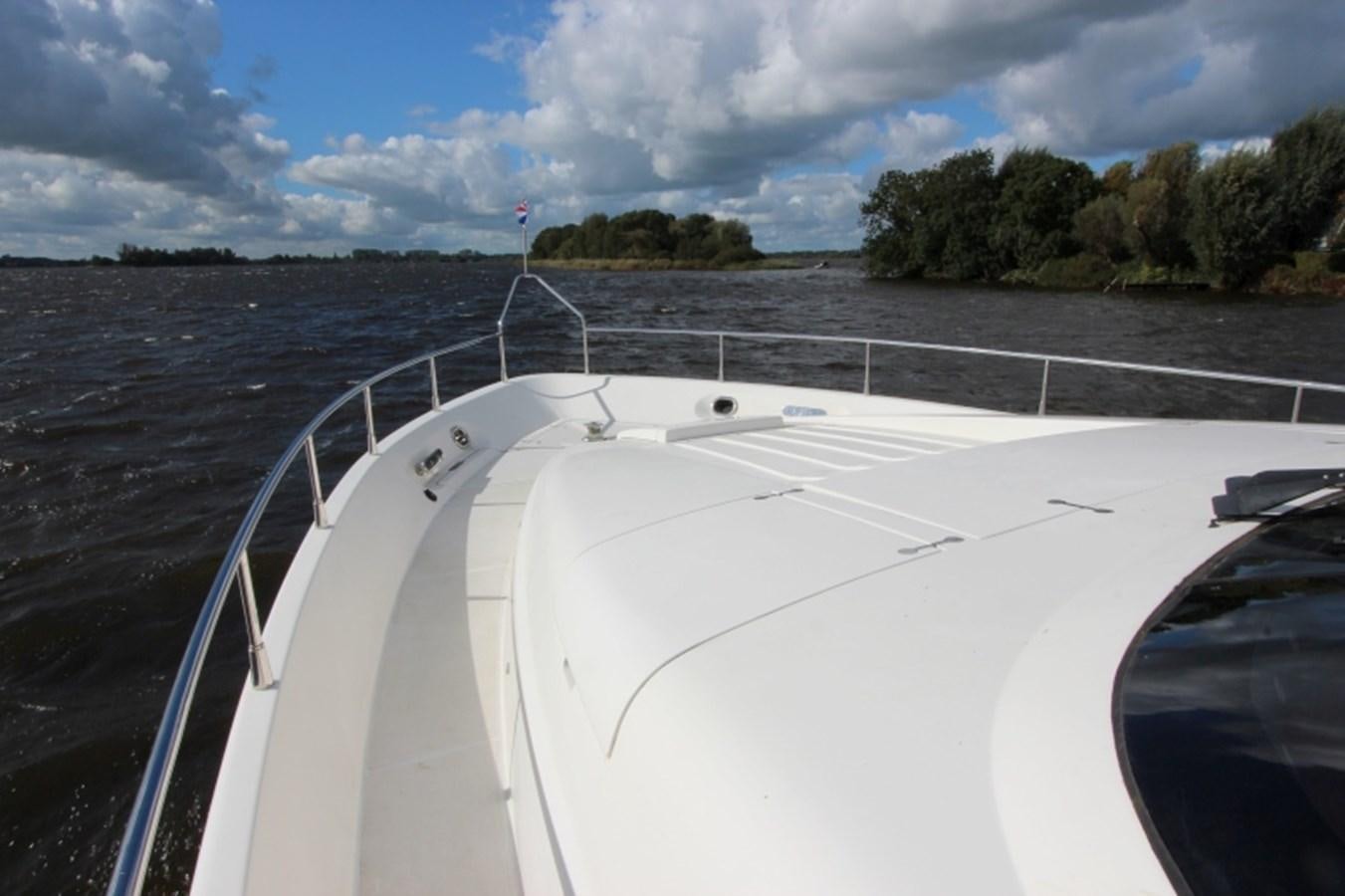 a boat on the water aboard THE RIVER Yacht for Sale