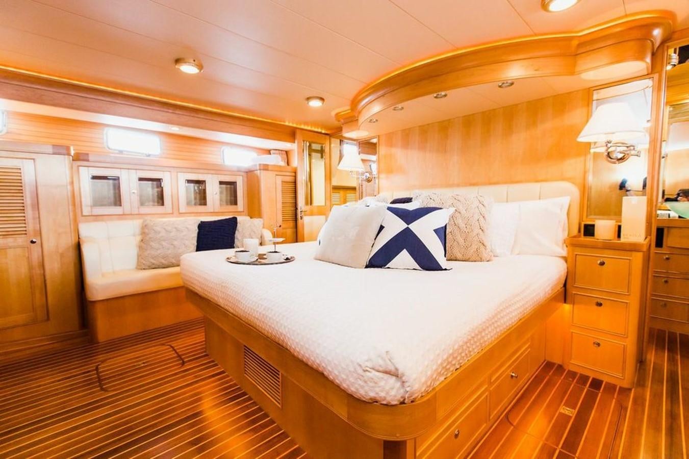 a bed in a room aboard 72' MARLOW RAISED PILOTHOUSE MOTOR YACHT EXPLORER I Yacht for Sale