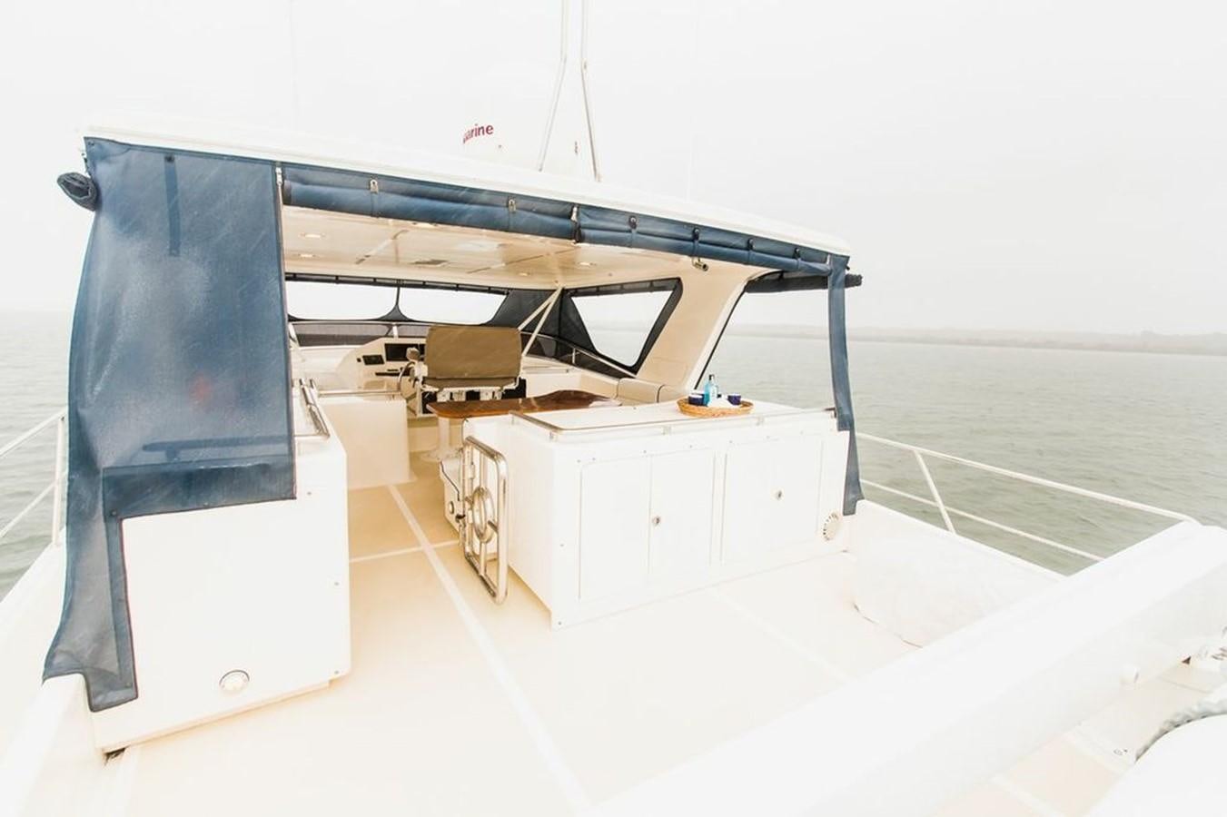 a white and blue tent aboard 72' MARLOW RAISED PILOTHOUSE MOTOR YACHT EXPLORER I Yacht for Sale