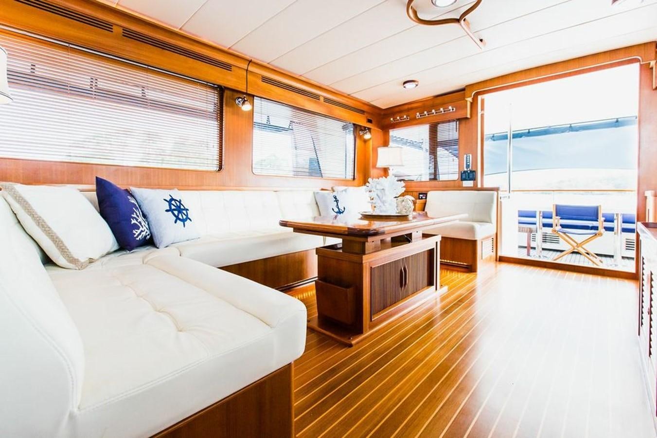 a room with a bed and a desk aboard 72' MARLOW RAISED PILOTHOUSE MOTOR YACHT EXPLORER I Yacht for Sale
