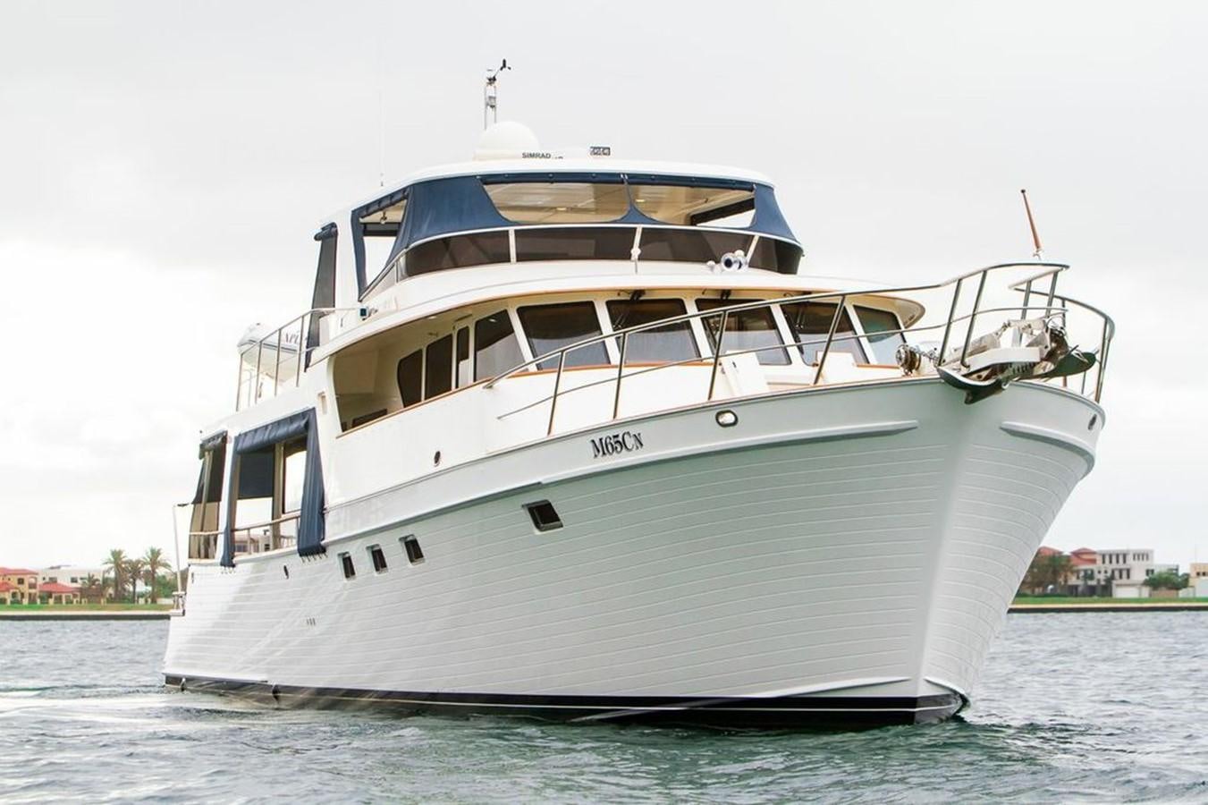 a large white boat aboard 72' MARLOW RAISED PILOTHOUSE MOTOR YACHT EXPLORER I Yacht for Sale