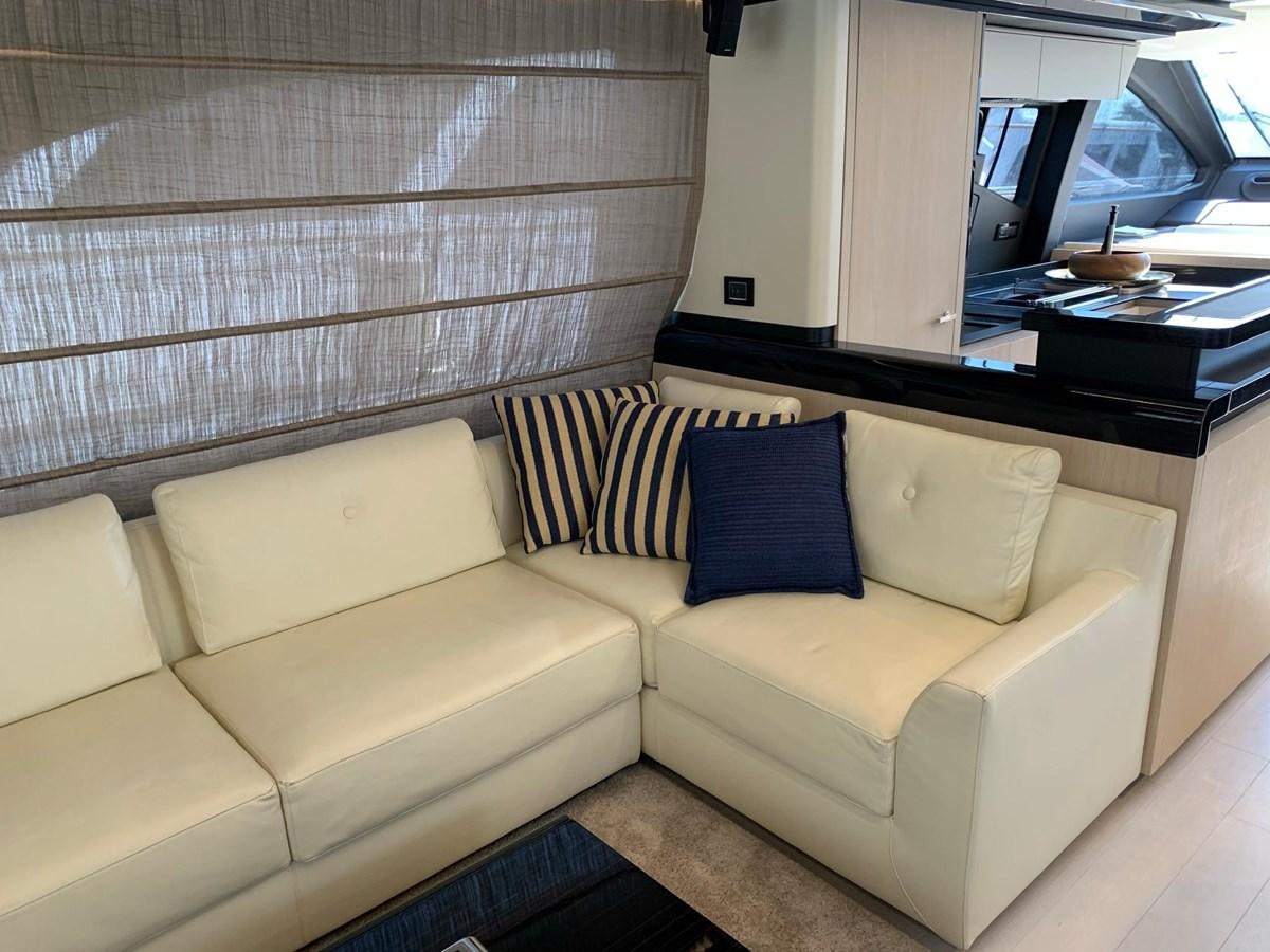 a couch in a room aboard AMALFI Yacht for Sale