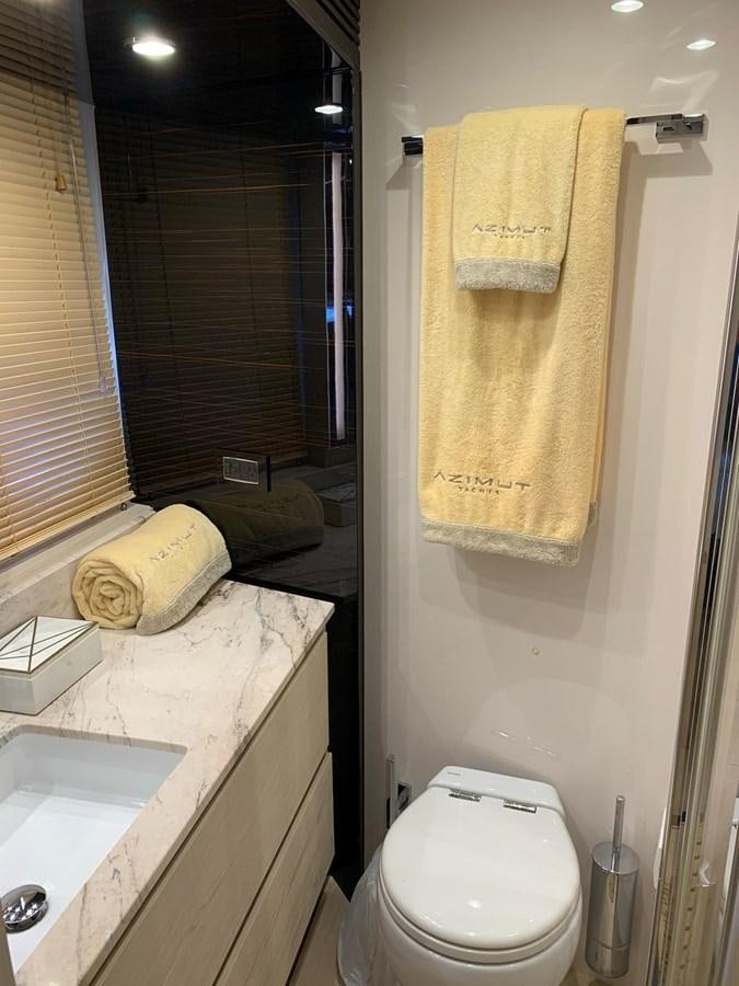 a bathroom with a towel on the wall aboard AMALFI Yacht for Sale