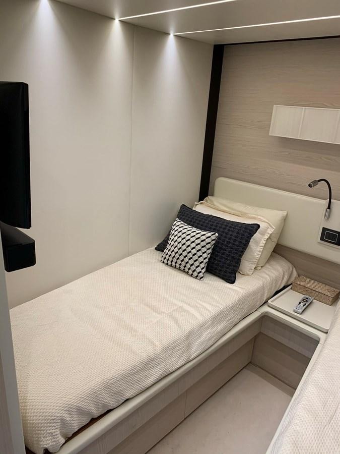 a bed with pillows aboard AMALFI Yacht for Sale