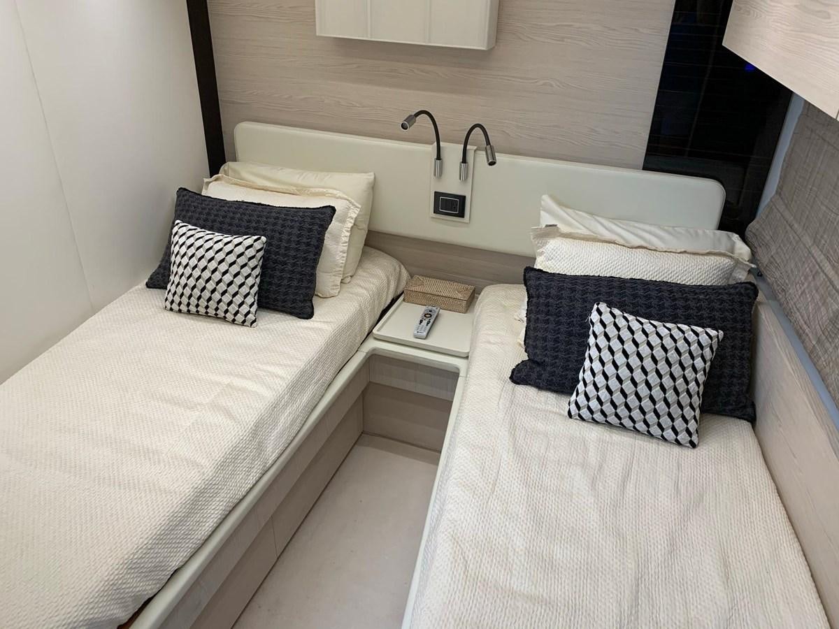 a couple of beds in a hotel room aboard AMALFI Yacht for Sale