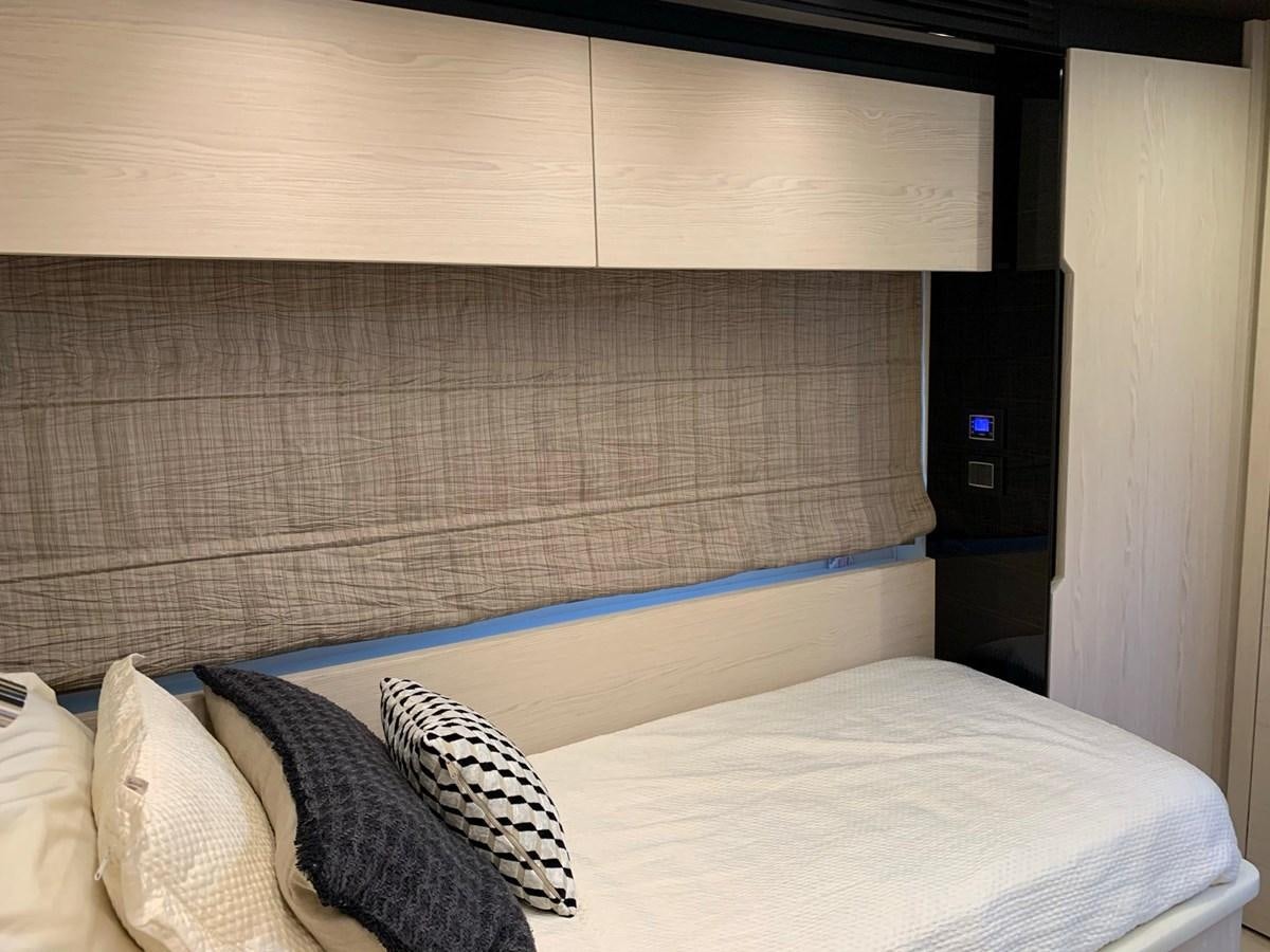a bed with pillows aboard AMALFI Yacht for Sale