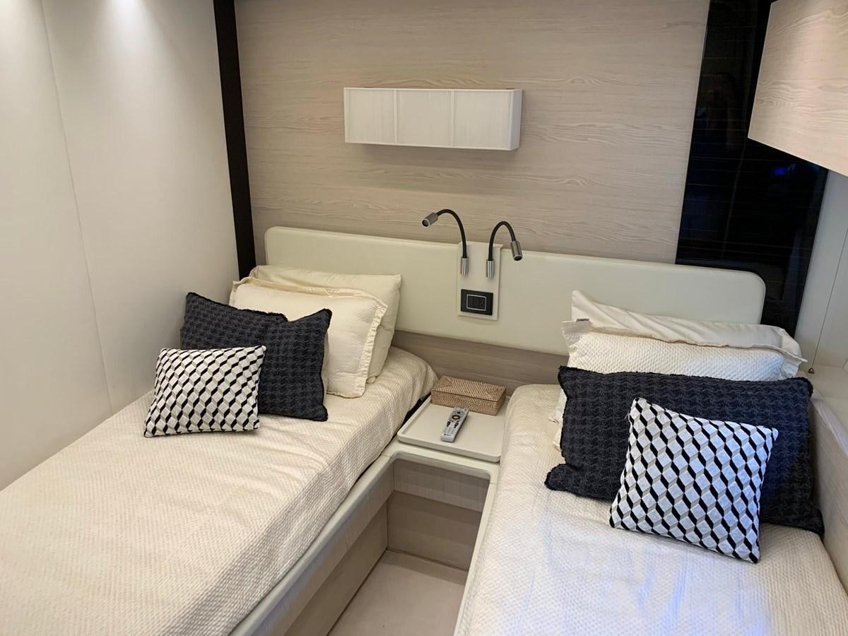 a couple of beds in a hotel room aboard AMALFI Yacht for Sale