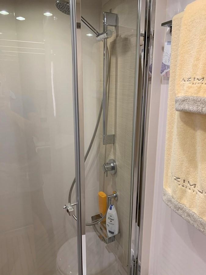 a shower with a glass door aboard AMALFI Yacht for Sale