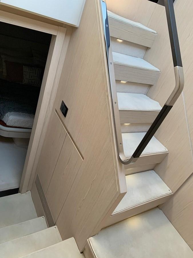 a closet with a shelf aboard AMALFI Yacht for Sale