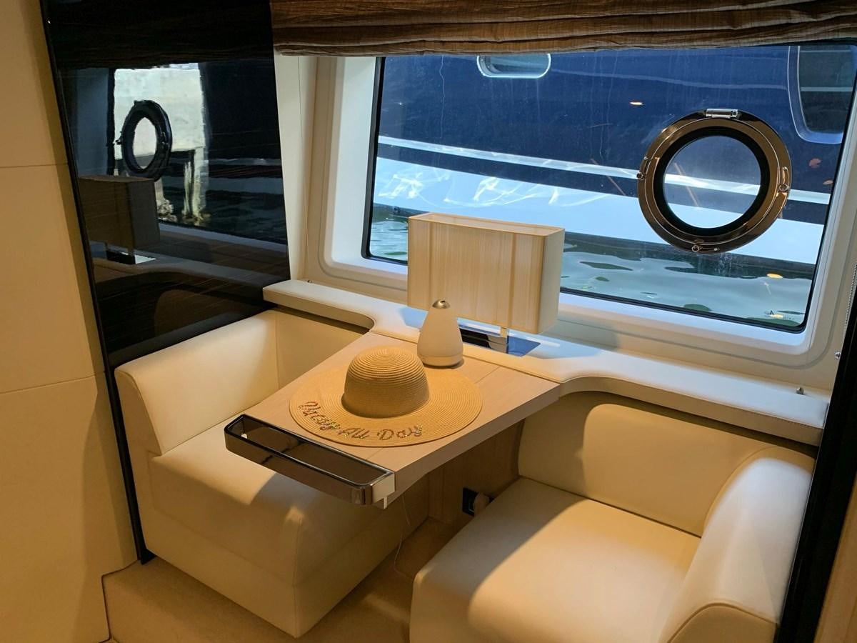 a room with a desk and a window aboard AMALFI Yacht for Sale