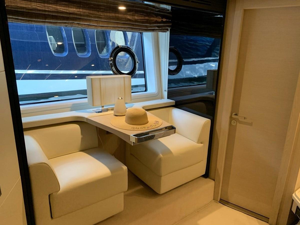 a room with a desk and a window aboard AMALFI Yacht for Sale