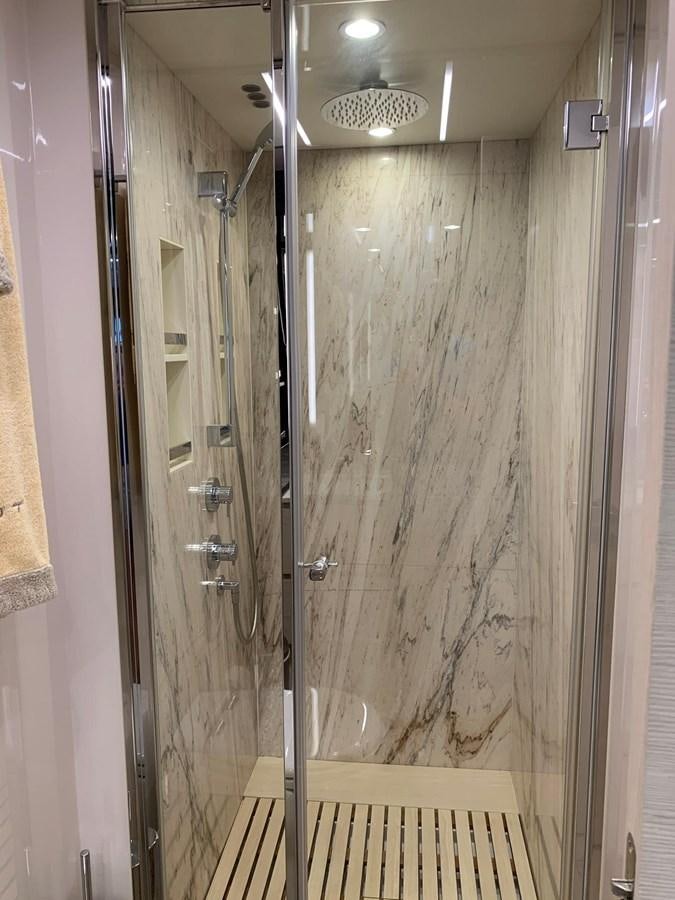 a shower unit with a glass door aboard AMALFI Yacht for Sale